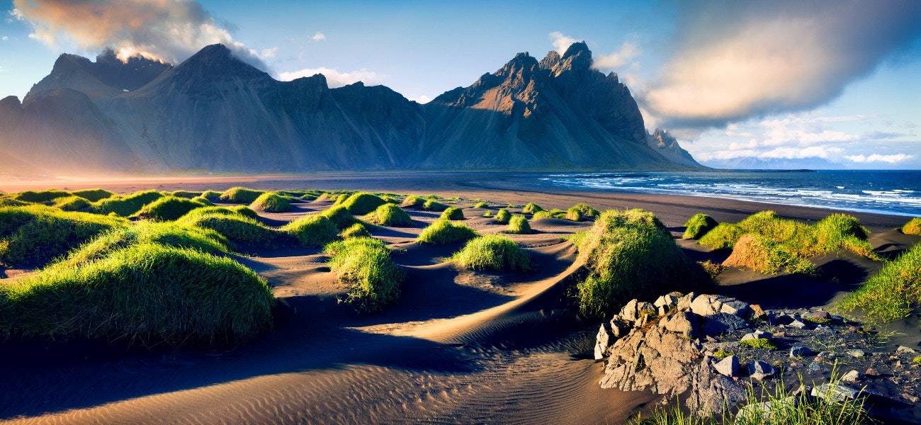 The green dunes of Stokksnes with Vestrahorn mountain in the background